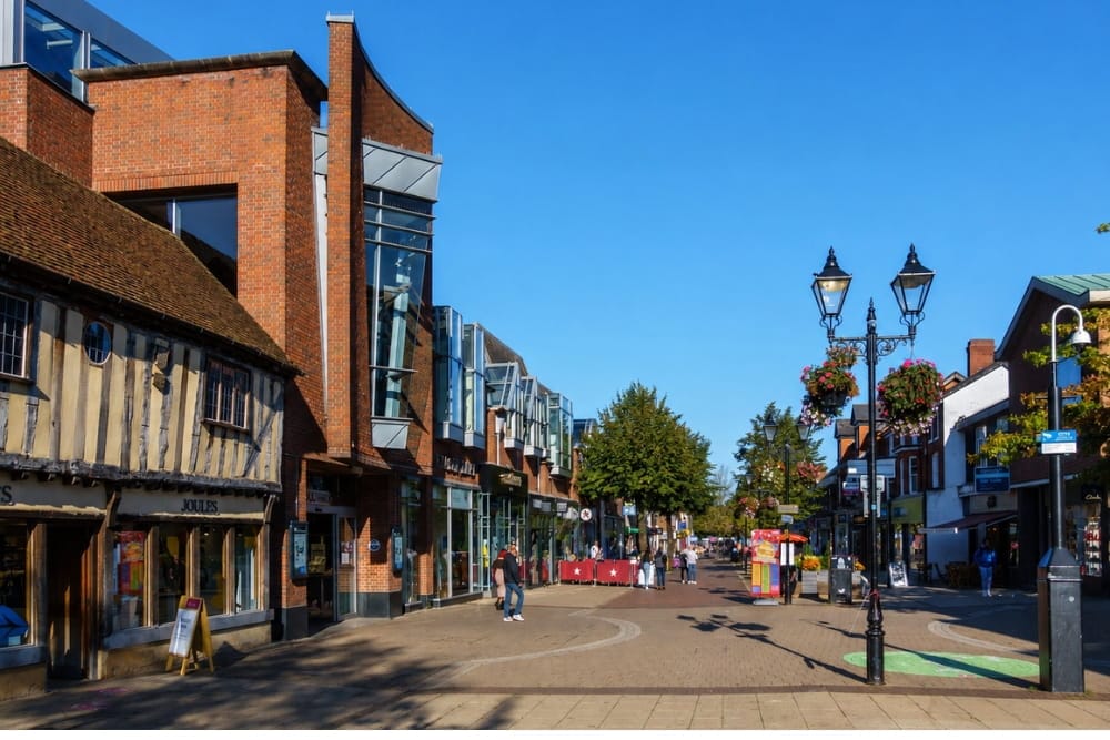 Sunny high street shops in town centre near emergency vehicle breakdown Solihull