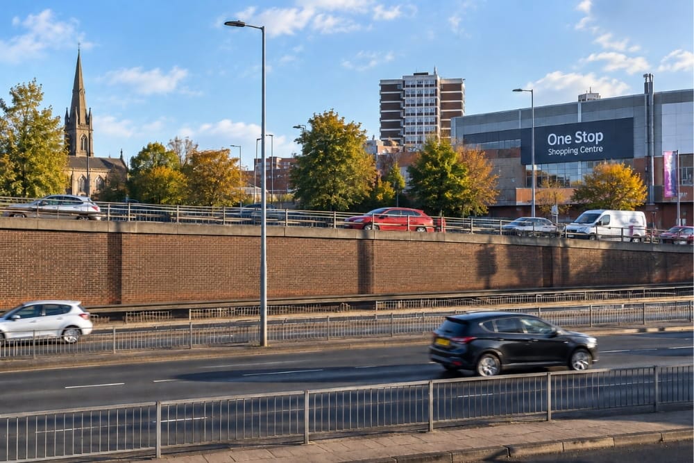 Traffic flows past One Stop Shopping Centre, representing car breakdown recovery Perry Barr service routes